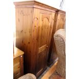 A Victorian style pine wardrobe