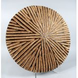 An unusual carved African circular shield