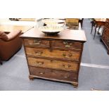 A George III oak chest of drawers