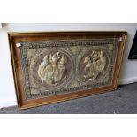 A Tai metal thread embroidered picture of figures on mythological beasts framed and glazed