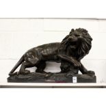 A large French pattenated terracotta model of a lion