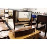 A George III mahogany three drawer dressing table mirror