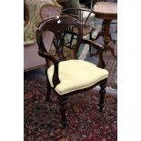 A set of eight Victorian style mahogany and upholstered dining chairs, one with arms