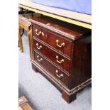 A small Georgian style mahogany three drawer chest