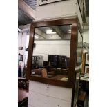 A mahogany framed wall mirror