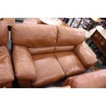 An Italian brown leather upholstered two seater settee