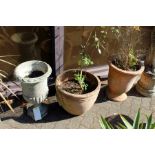 Three various garden pots (af)