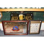 A pub mirror amusing pub clock and framed and glazed cigarette cards