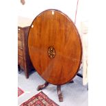 A Victorian inlaid walnut oval tilt top breakfast table