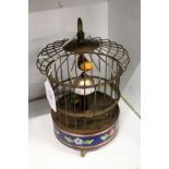 A novelty birdcage clock
