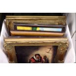 A box of paintings and prints