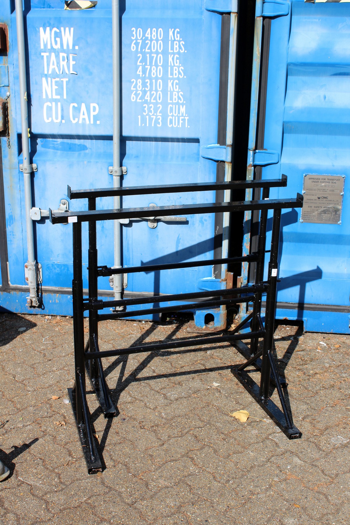 A pair of builders scaffold board stands