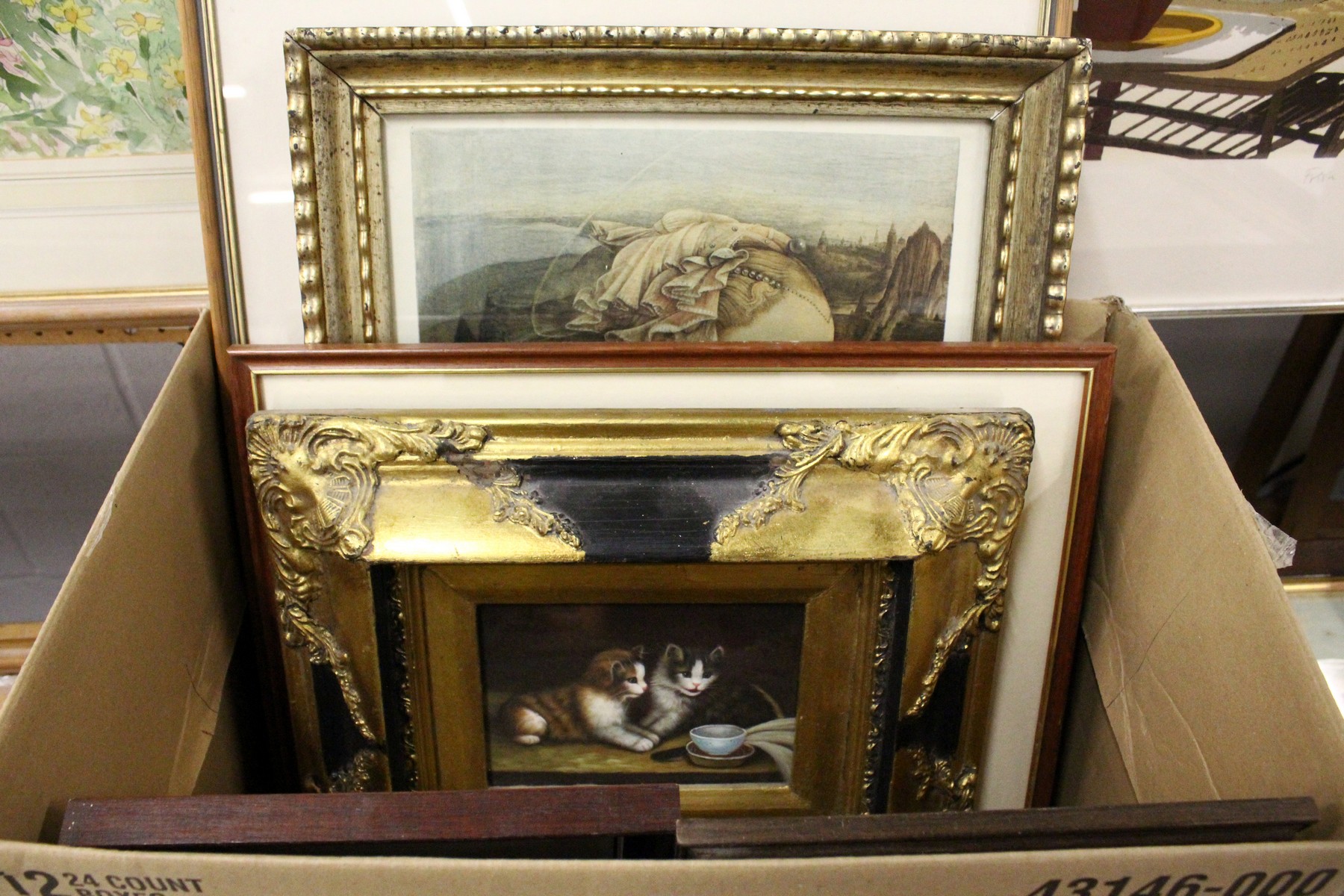 An oil painting of cats and various other pictures