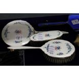 Silver and enamel back three piece dressing table set