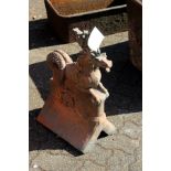 A large ornate terracotta ridge tile finial modelled as dragons