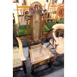 A walnut highback side chair with canework back and seat