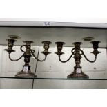 A pair of plated candelabra