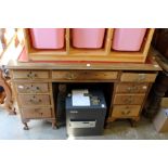 A mahogany pedestal desk