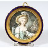 A good circular portrait miniature of a lady wearing a hat in an enamel frame