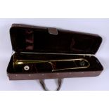 KING - a trombone in a fitted hard case. Possibly an imitation.