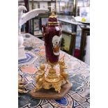 A pair of impressive continental ormolu marble and porcelain urns on stands