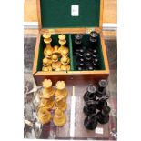 A good quality ebony and boxwood chess pieces with weighted bases