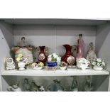 A shelf of decorative china