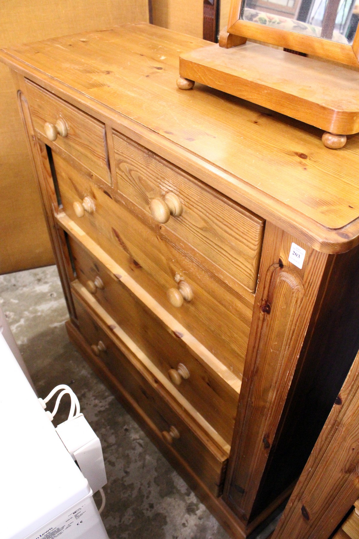 A Victorian style pine chest of drawers