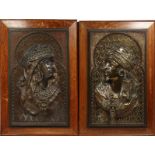 ARTHUR WAAGEN (GERMAN) 1833-1898.A SUPERB PAIR OF OAK FRAMED METAL BUSTS OF AN ARAB AND PRINCESS.