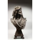 A SUPERB METAL BUST OF AN ARAB with moustache and beard, headdress and cloak, on a square base