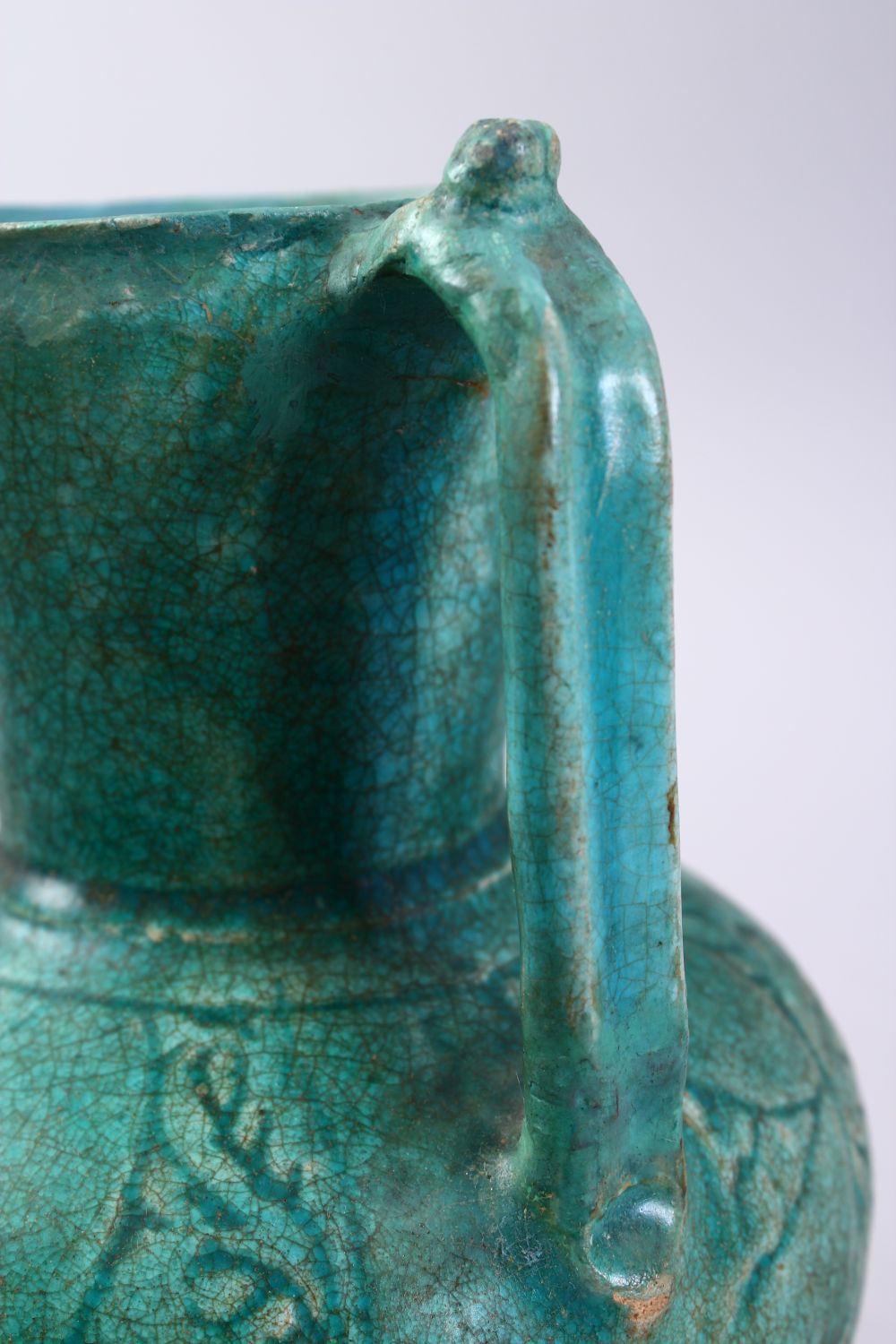 A GOOD EARLY ISLAMIC TURQUOISE GLAZED POTTERY JUG, 22cm high. - Image 9 of 9