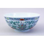 A GOOD CHINESE DOUCAI DECORATED PORCELAIN BOWL, the body decorated with scenes of formal scrolling