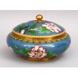 A CHINESE 20TH CENTURY CLOISONNE JAR & COVER, blue ground with floral decoration, 18cm.
