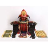 A GOOD JAPANESE EDO PERIOD RED AND GOLD LACQUERED SUIT OF ARMOUR, the museum quality suit of