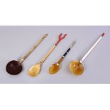A COLLECTION OF FOUR FINE 19TH CENTURY TURKISH OTTOMAN SHERBET SPOONS, made with various natural