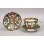 A 19TH CENTURY CHINESE CANTON FAMILLE ROSE PORCELAIN SAUCERS & CUP, with panel decoration of