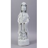 A GOOD 19TH CENTURY CHINESE BLANC DE CHINE PORCELAIN FIGURE OF GUANYING, 35cm high.