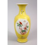 A CHINESE REPUBLIC STYLE YELLOW GROUND FAMILLE JAUNE PORCELAIN VASE, with panel decoration of