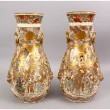 AN UNUSUAL PAIR OF JAPANESE MEIJI PERIOD OVOID BODY SATSUMA CERAMIC VASES, the body decorated with