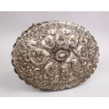A TURKISH OTTOMAN SILVER EMBOSSED MIRROR, decorated with formal motifs, 34cm x 24cm
