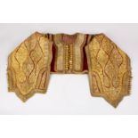 A GOOD TURKISH OTTOMAN CHILDS ROBE OR WAISTCOAT, IN VELVET WITH GOLDEDN THREAD EMBROIDERY.142cm