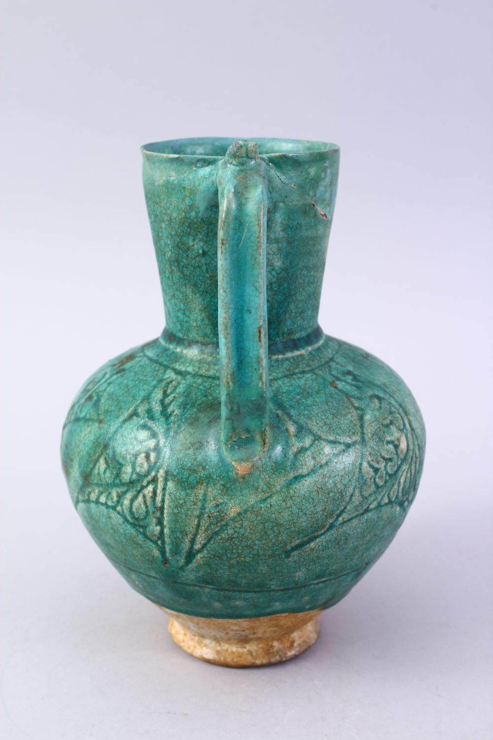 A GOOD EARLY ISLAMIC TURQUOISE GLAZED POTTERY JUG, 22cm high. - Image 4 of 9