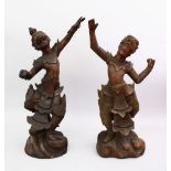 TWO GOOD INDIAN CARVED WOODEN DANCING FIGURES, 56cm high