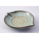 AN UNUSUAL CHINESE PEACH SHAPED CALLIGRAPHIC RU WARE DISH, the body in the form of a peach and