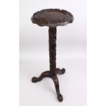 A GOOD 19TH CENTURY CHINESE CARVED HARDWOOD TRIPLE FOOT STAND, the stand with bamboo carved