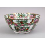 A CHINESE CANTON STYLE FAMILLE ROSE PORCELAIN BOWL, base with red seal mark. 20cm.