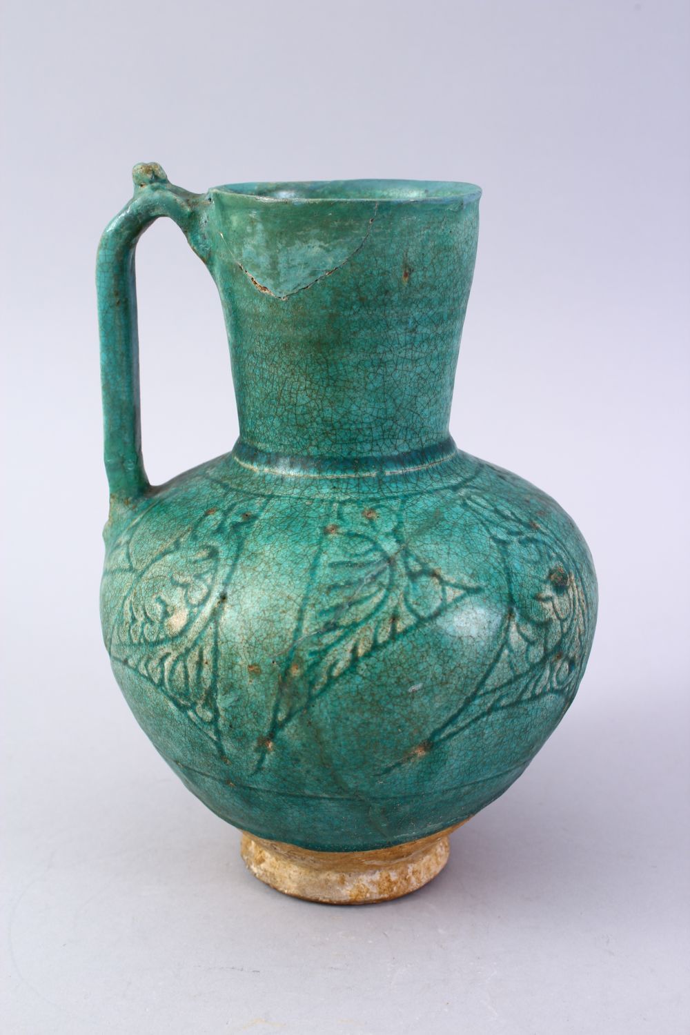 A GOOD EARLY ISLAMIC TURQUOISE GLAZED POTTERY JUG, 22cm high. - Image 3 of 9