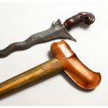 A GOOD 19TH CENTURY INDONESIAN KRIS DAGGER, with an olive wood and chased brass scabbard, and a