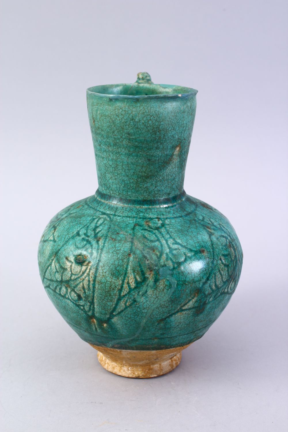 A GOOD EARLY ISLAMIC TURQUOISE GLAZED POTTERY JUG, 22cm high. - Image 2 of 9