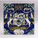 A GOOD PERSIAN QAJAR CERAMIC TILE, depicting figures and animals upon blue ground with script, 28cm